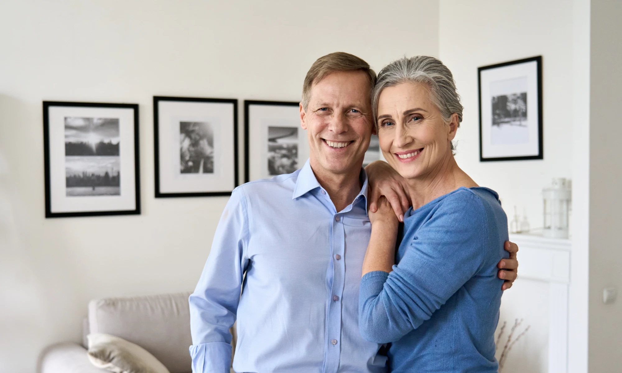 mid aged couple in lounge room